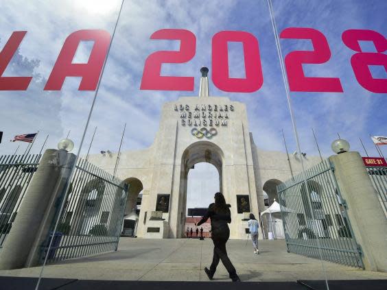 The torch is lit at the Los Angeles Coliseum after being named 2028 host (Getty)