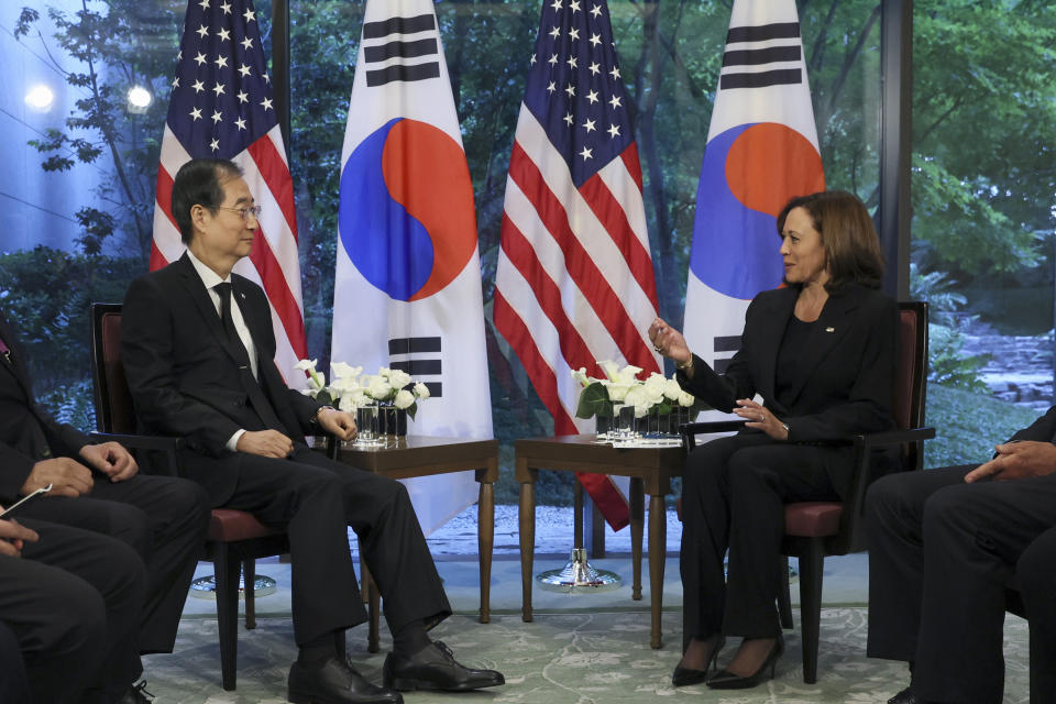 FILE - U.S. Vice President Kamala Harris, center right, holds a bilateral meeting with South Korea's Prime Minister Han Duck-soo, center, left, in Tokyo, Sept. 27, 2022. Harris is trying to bolster relations between Japan and South Korea to present a united front to growing Chinese influence, but tension and bad relations between the two countries are not helping. (Leah Millis/Pool Photo via AP, File)