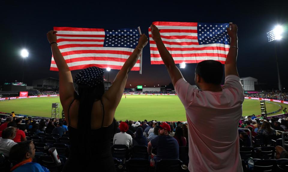 <span>USA fans show their support in the T20 Cricket World Cup match against <a class="link " href="https://sports.yahoo.com/soccer/teams/canada-women/" data-i13n="sec:content-canvas;subsec:anchor_text;elm:context_link" data-ylk="slk:Canada;sec:content-canvas;subsec:anchor_text;elm:context_link;itc:0">Canada</a>. </span><span>Photograph: Matt Roberts-ICC/ICC/Getty Images</span>