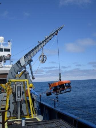 The Scripps Institution of Oceanography ROV being deployed over the side of the ship. 