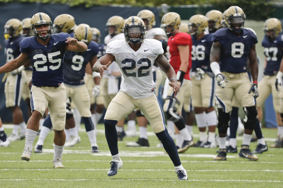 Pitt tight ends coach Tim Salem either really loves to work or really hates doing chores. (AP Photo)