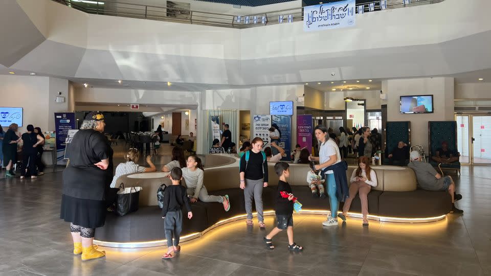 Israelis who were evacuated from the north of the country and seen in a hotel lobby in Tiberias, Israel, on November 16. - Tara John/CNN