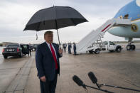 President Donald Trump speaks to reporters at Andrews Air Force Base, Md., as as he returns from campaign stops in Florida and Georgia Friday, Sept. 25, 2020. (AP Photo/Evan Vucci)