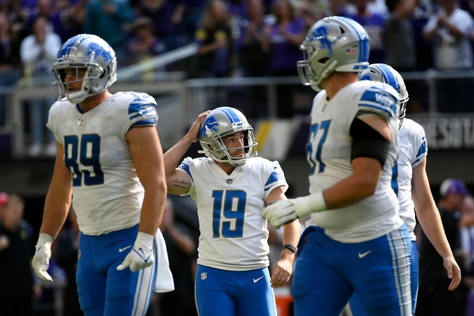 Lions place kicker Austin Seibert (19) reacts after missing a field goal late in the fourth quarter against the Vikings, Sunday, Sept. 25, 2022, in Minneapolis. The Vikings won, 28-24.