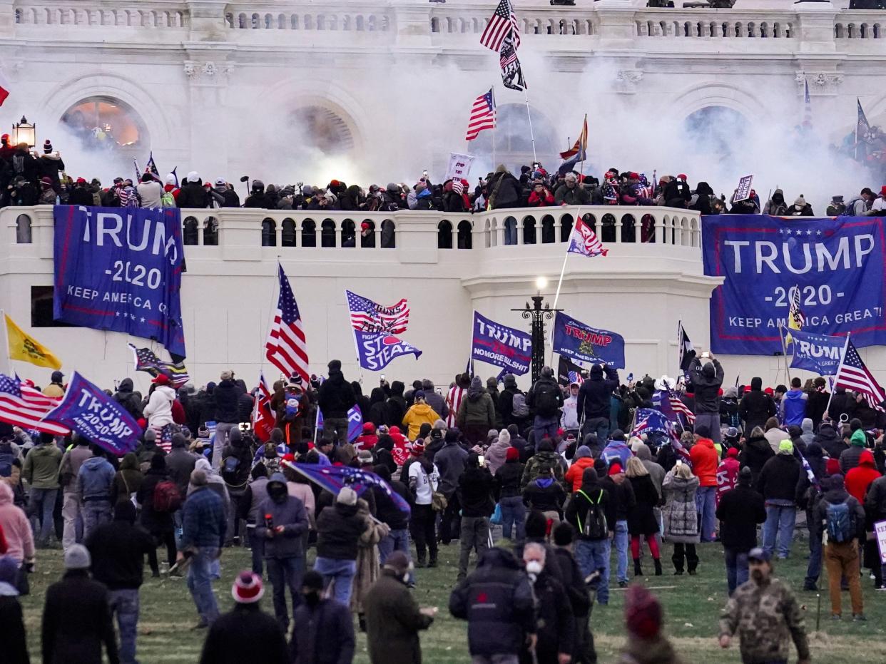 In this Jan. 6, 2021 file photo rioters supporting President Donald Trump storm the Capitol in Washington.