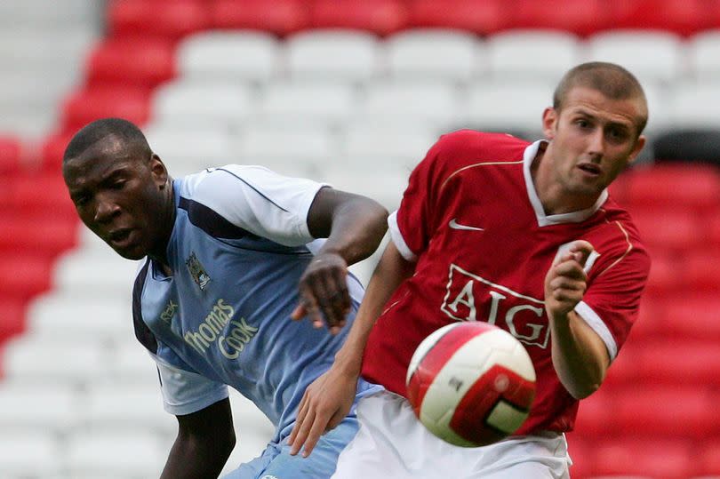 Michael Lea clashes with Manchester City's Ishmael Miller at Old Trafford in 2007