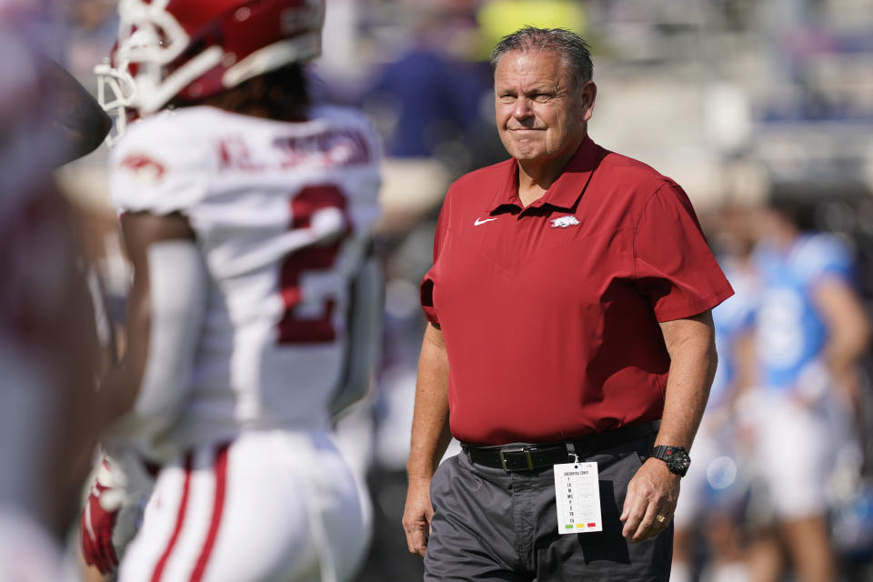 Arkansas head coach Sam Pittman watches his players as they warmup prior to their NCAA college football game against Mississippi, Saturday, Oct. 9, 2021, in Oxford, Miss. (AP Photo/Rogelio V. Solis)