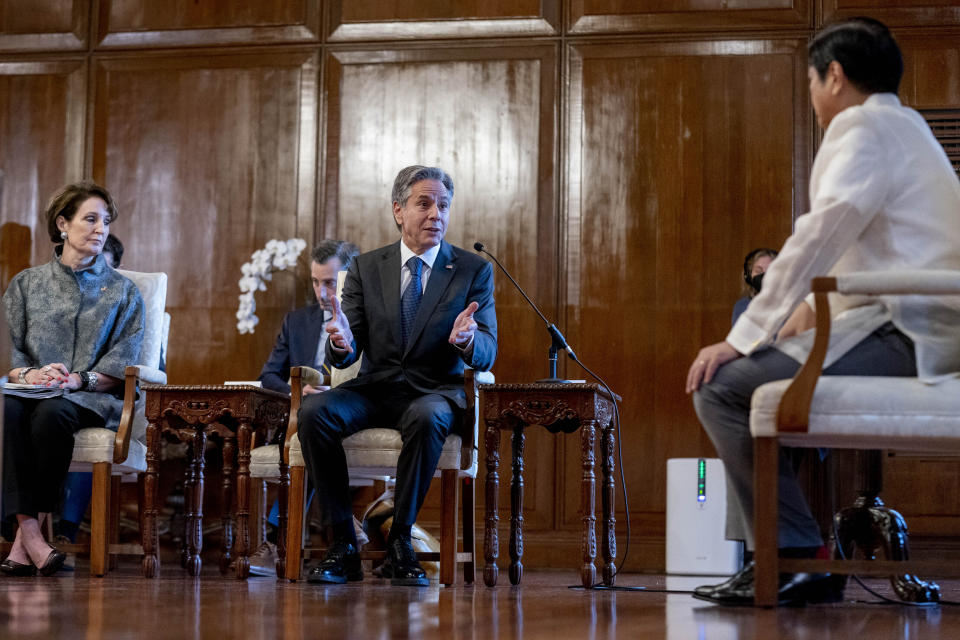 Secretary of State Antony Blinken, accompanied by U.S. Ambassador to the Philippines MaryKay Carlson, left, meets with Philippine President Ferdinand Marcos Jr., right, at the Malacanang Palace in Manila, Philippines, Saturday, Aug. 6, 2022. Blinken is on a ten day trip to Cambodia, Philippines, South Africa, Congo, and Rwanda. (AP Photo/Andrew Harnik, Pool)