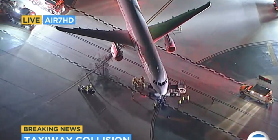 An American Airlines passenger jet collided with a shuttle bus at Los Angeles Airport on Friday night (ABC News)