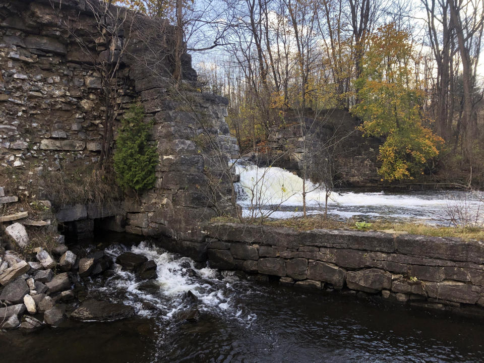 FILE - This Nov. 6, 2019, file photo shows the Harrower Pond Dam in Amsterdam, N.Y. U.S. Sen. Kirsten Gillibrand, D-N.Y., is proposing Tuesday, Dec. 17, 2019, to boost federal efforts to fortify the nation's dams following an Associated Press investigation that found scores of potentially troubling dams around the country. (AP Photo/Mary Esch, File)