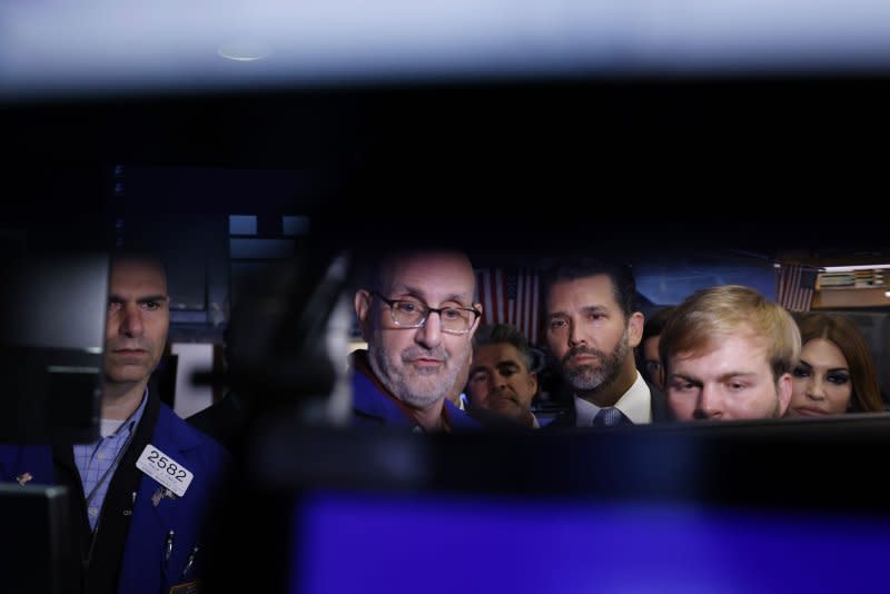 PublicSq. Founder and CEO Michael Seifert, Colombier Acquisition Corp. Chairman and CEO Omeed Malik, Donald Trump Jr. and Kimberly Guilfoyle watch he early trading for PublicSq. after the opening bell at the New York Stock Exchange on Wall Street in New York City on Thursday, July 20, 2023. PublicSq began trading on the New York Stock Exchange today under ticker symbol PSQH. Photo by John Angelillo/UPI