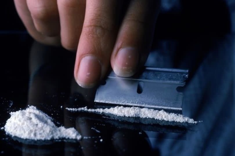 Close-up of a drug user taking drugs