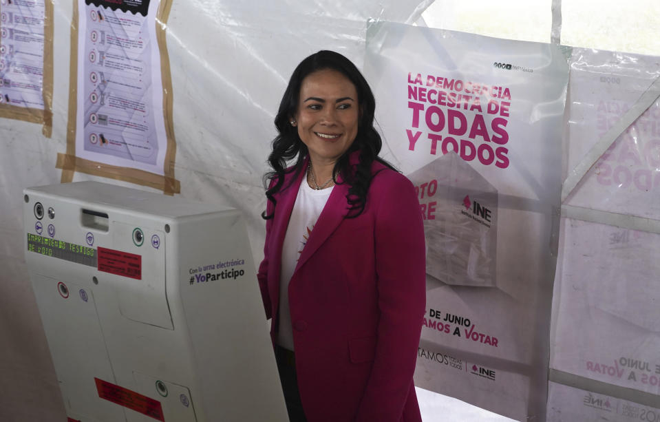 Alejandra del Moral, who is running for governor of Mexico state with the PRI-PAN-PRD coalition, smiles after casting her ballot during the local elections in Cuautitlán Izcalli, Mexico state, Mexico, Sunday, June 4, 2023. (AP Photo/Marco Ugarte)