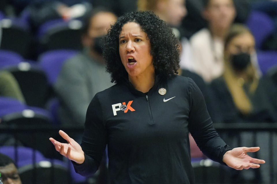 Duke head coach Kara Lawson shouts to her team during the second half of an NCAA college basketball game against Connecticut in the Phil Knight Legacy tournament Friday, Nov. 25, 2022, in Portland, Ore. (AP Photo/Rick Bowmer)