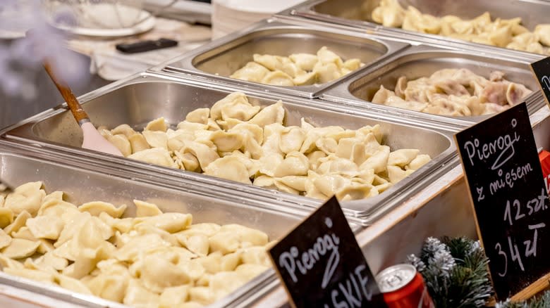 Trays of cooked pierogi for sale