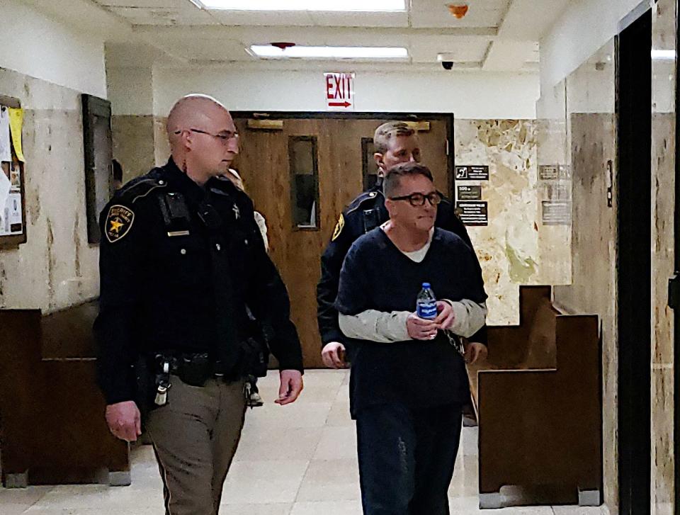 David Hampton is escorted out of the 137th District Court after District Judge John McClendon sentenced him to 50 years in prison for the Aug. 3, 2019 murder of 79-year-old Celestino Rodriguez.