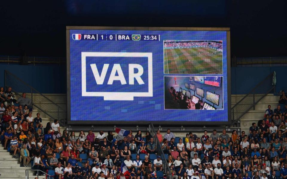 The crowd awaits a judgment from the VAR after France's goal against Brazil at the Women's World Cup - AFP