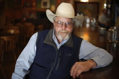 Cowboy poet John Dofflemyer poses at the 31st National Cowboy Poetry Gathering in Elko, Nevada January 28, 2015. REUTERS/Jim Urquhart