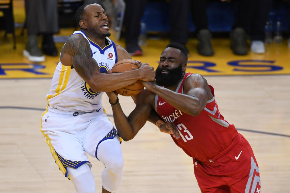 Andre Iguodala stifles the Rockets’ James Harden in Game 3 on Sunday night. (AP)