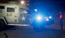 Aug 23, 2020; Kenosha, WI, USA; Kenosha County Sheriffs deputies in a tactical vehicle confront protestors outside the Kenosha County Courthouse in Kenosha on Sunday, Aug. 23, 2020. Kenosha police shot a man Sunday evening, setting off unrest in the city after a video appeared to show the officer firing several shots at close range into the man's back.Mandatory Credit: Mike De Sisti/Milwaukee Journal Sentinel via USA TODAY NETWORK/Sipa USA