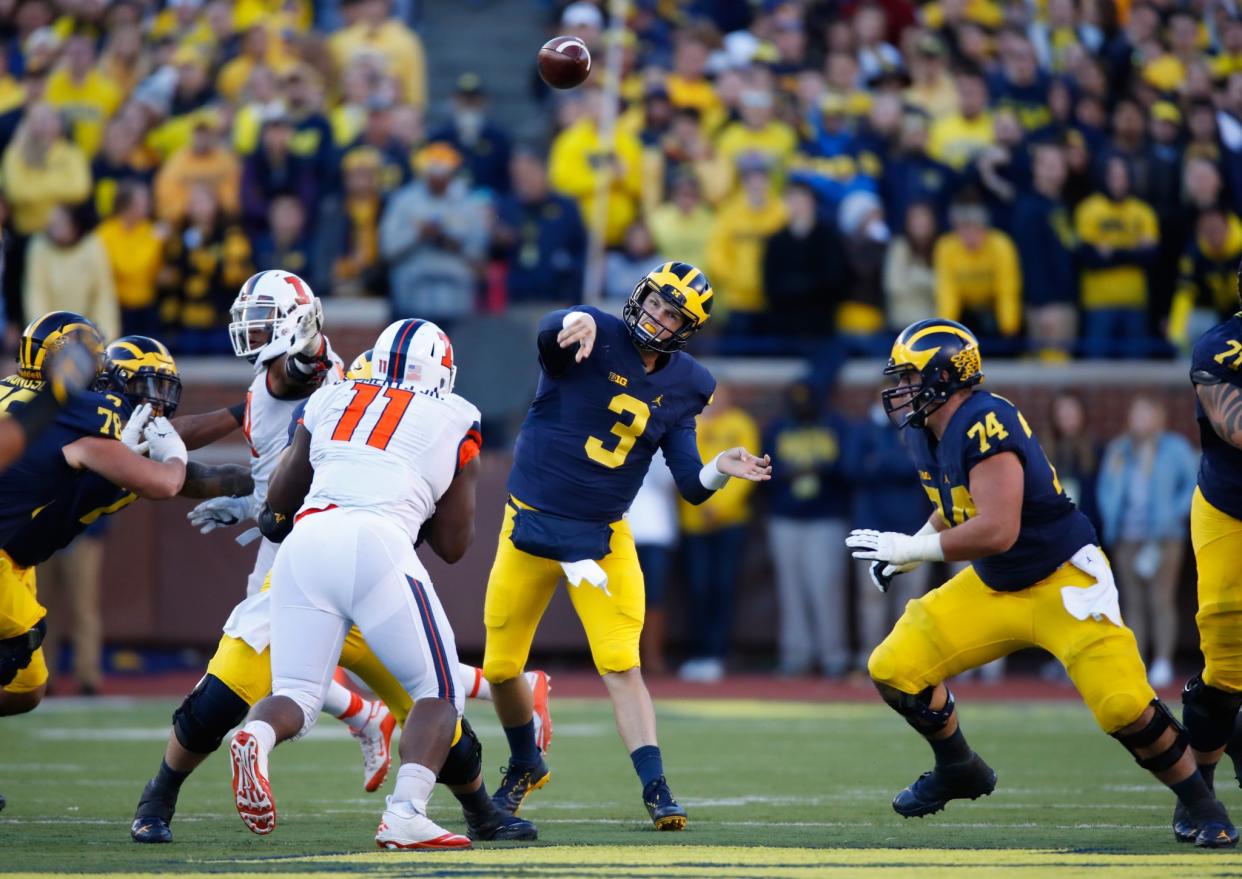 Will Michigan remain undefeated after playing reeling rival Michigan State. (Getty)