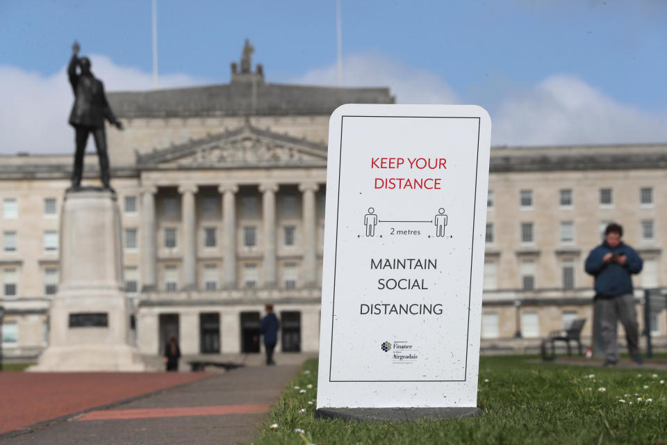 File photo dated 01/04/21 of a social distancing sign in the Stormont Estate in Belfast. Stormont ministers will meet later to consider further Covid-19 relaxations for Northern Ireland and discuss ways to tackle the region's spiralling health waiting lists. Issue date: Monday July 26, 2021.