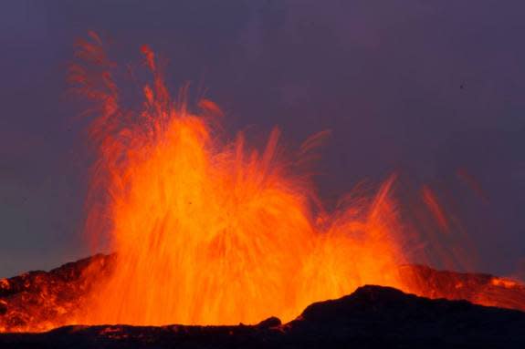 This fire-fountain eruption in Iceland is similar to those that peppered the moon shortly after its formation. The earthly explosion is driven by water and carbon dioxide gas, but new research suggests carbon monoxide was the culprit on the ear