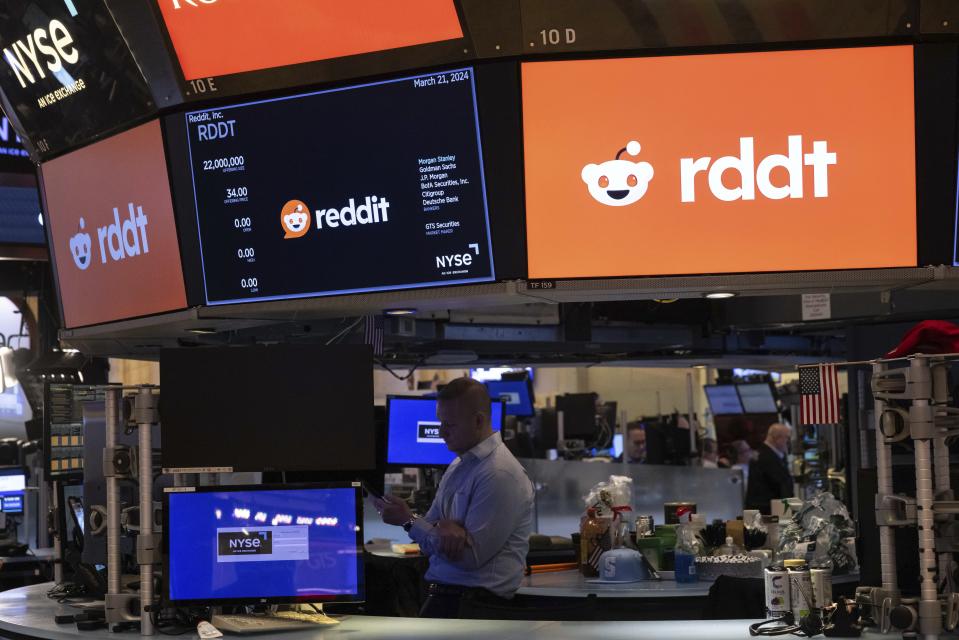 Reddit Inc. signage is seen on the New York Stock Exchange trading floor, prior to Reddit IPO, Thursday, March. 21, 2024. The market debut is likely to spur a flurry of commentary on Reddit’s own platform, as well as competing social media outlets. (AP Photo/Yuki Iwamura)