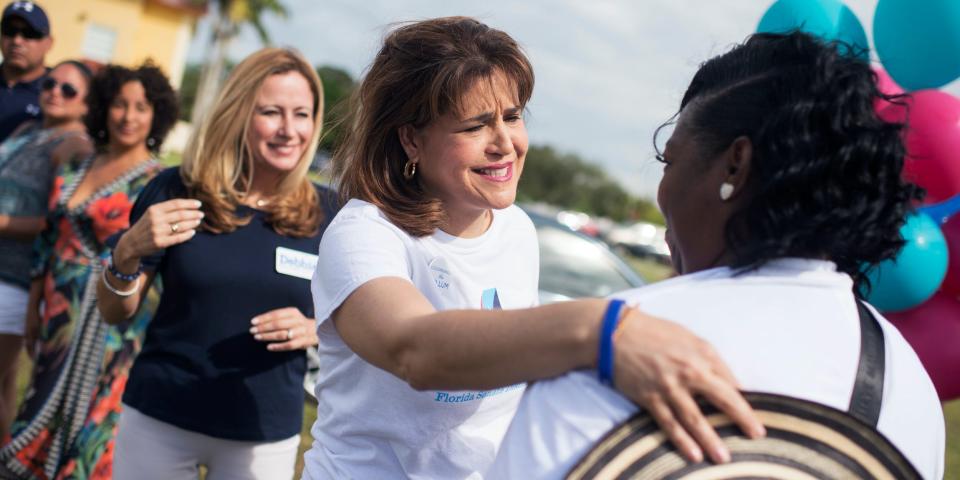 Annette Taddeo speaks to a voter.