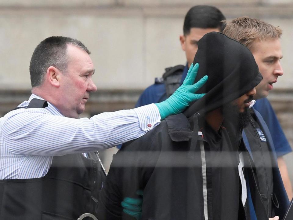 A man is led away by police in Westminster after an arrest was made (REUTERS/Toby Melville)