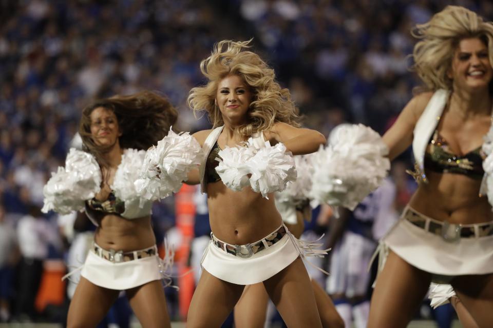 <p>Members of the Indianapolis Colts cheerleaders perform during the first half of an NFL football game between the Tennessee Titans and the Indianapolis Colts in Indianapolis, Sunday, Nov. 20, 2016. (AP Photo/Jeff Roberson) </p>