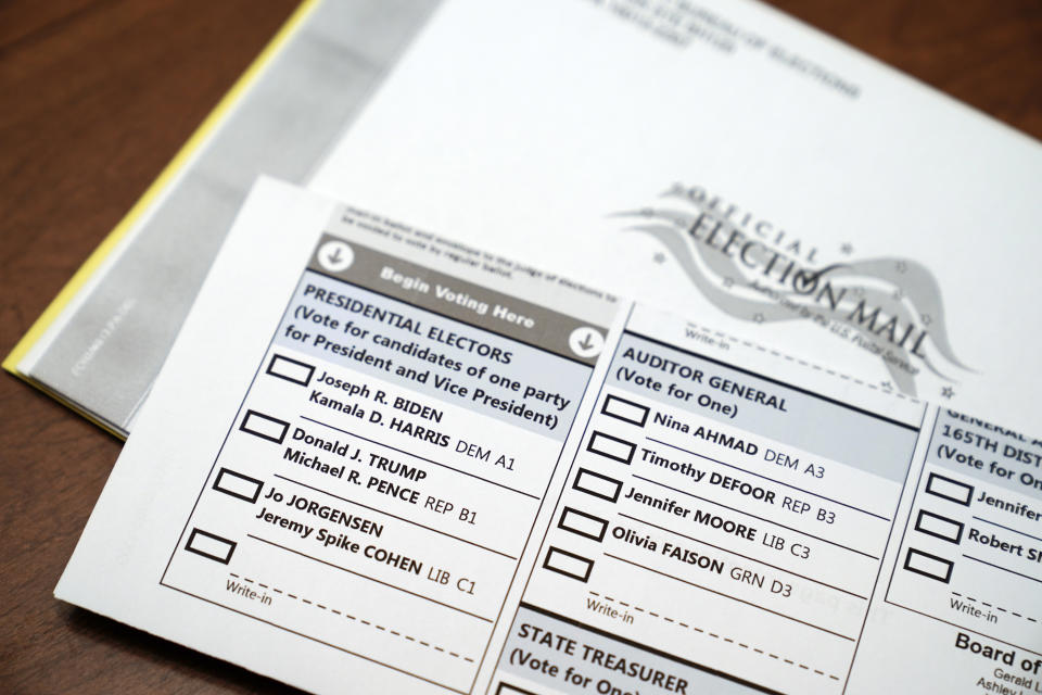 A mail-in official ballot for the 2020 General Election in the United States is shown, Tuesday, Oct. 13, 2020, in Marple Township, Pa. (AP Photo/Matt Slocum, File)