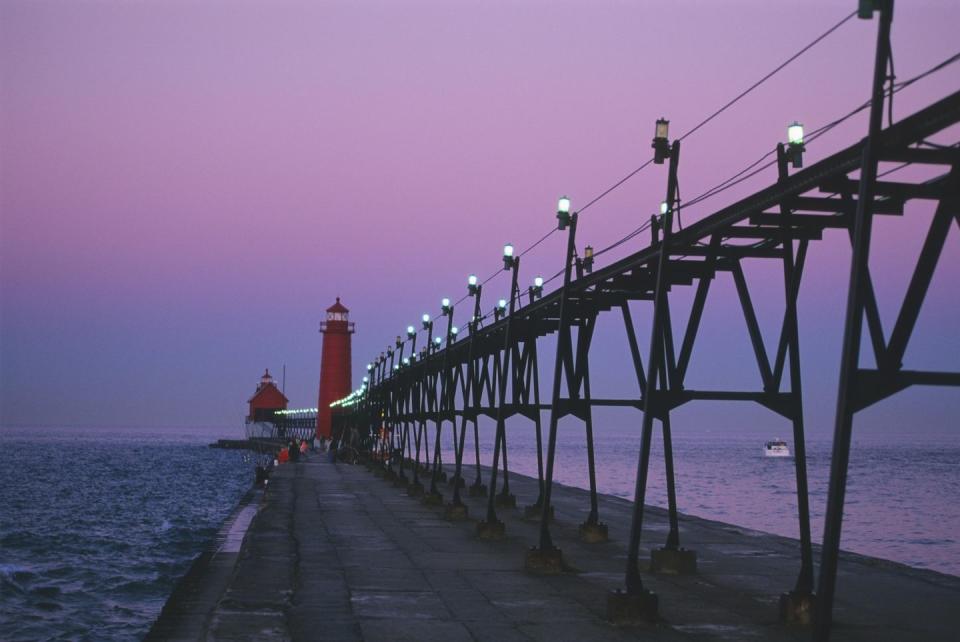 <p>Located on the Eastern shore of Lake Michigan and the mouth of the Grand River is <a href="https://www.tripadvisor.com/Tourism-g42252-Grand_Haven_Ottawa_County_Michigan-Vacations.html" rel="nofollow noopener" target="_blank" data-ylk="slk:this appropriately named town;elm:context_link;itc:0;sec:content-canvas" class="link ">this appropriately named town</a>, which offers wine tasting, sand dune riding and an annual Coast Guard Festival at the end of every summer.</p>