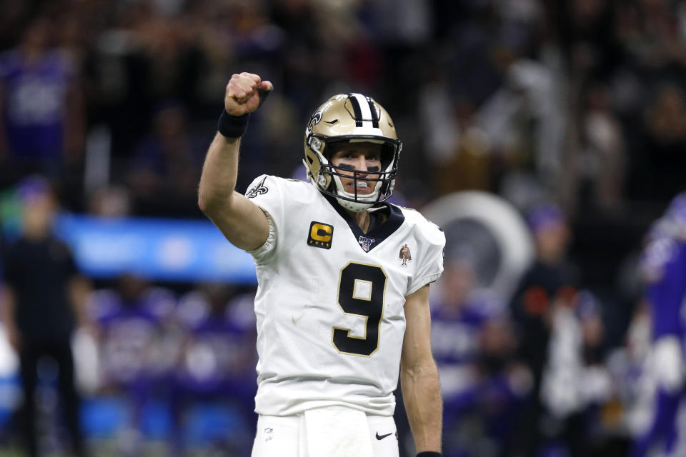 New Orleans Saints quarterback Drew Brees (9) celebrates after throwing a touchdown pass to Taysom Hill in the second half of an NFL wild-card playoff football game against the Minnesota Vikings, Sunday, Jan. 5, 2020, in New Orleans. (AP Photo/Butch Dill)