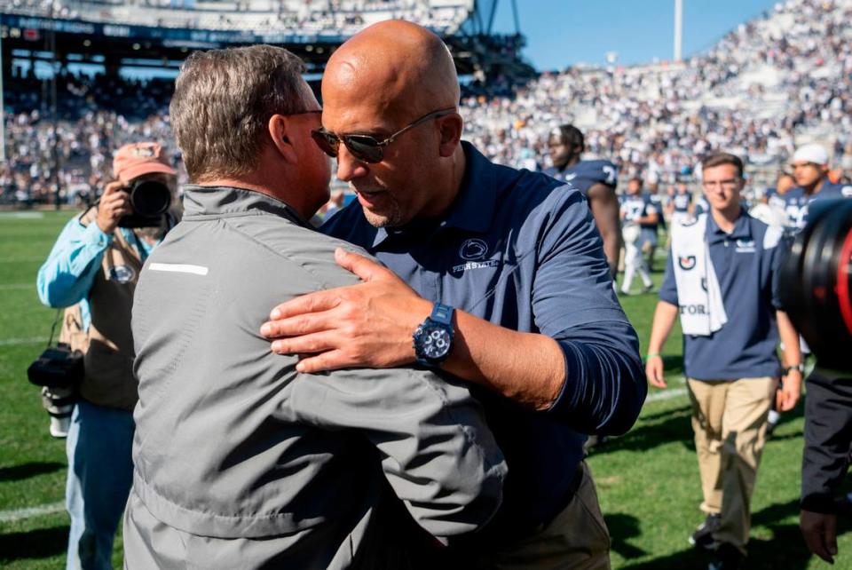 Penn State football coach James Franklin shakes hands with Central Michigan coach Jim McElwain after the game on Saturday, Sept. 24, 2022.