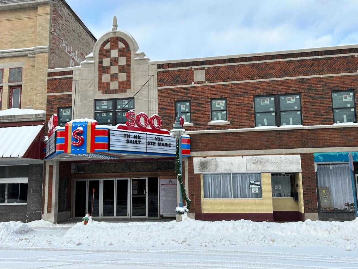 The new sign of the Soo Theatre is a replica of the most well known previous marquee at the theater.