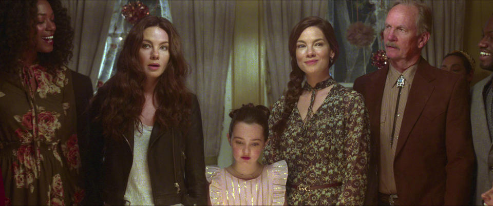 This image released by Netflix shows, from left, Alise Willis as Meg, Michelle Monaghan as Gina McCleary, Gable Swanlund as Mattie, Michelle Monaghan as Leni McCleary, Michael O'Neill as Victor in a scene from "Echoes." (Netflix via AP)