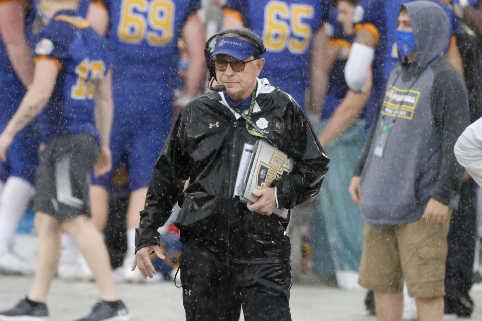 FILE - South Dakota State coach John Stiegelmeier watches the team play against Sam Houston State during the first half of the NCAA college football FCS championship game in Frisco, Texas, May 16, 2021. South Dakota State faces Delaware at home in the FCS playoffs. (AP Photo/Michael Ainsworth, File)