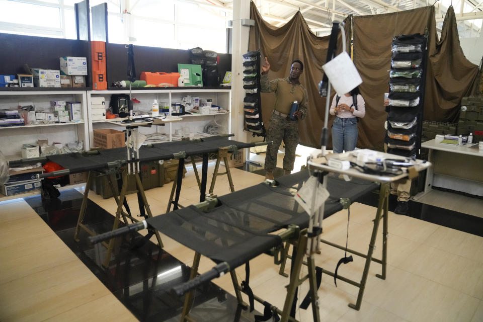 A U.S. soldier shows a treatment area inside the Lal-lo airport, Cagayan province, northern Philippines Monday, May 6, 2024. The United States and the Philippines, which are longtime treaty allies, have identified the far-flung coastal town of Lal-lo in the northeastern tip of the Philippine mainland as one of nine mostly rural areas where rotating batches of American forces could encamp indefinitely and store their weapons and equipment within local military bases under the Enhanced Defense Cooperation Agreement, or EDCA. (AP Photo/Aaron Favila)