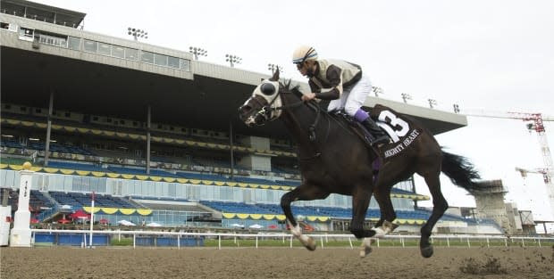 Mighty Heart, seen above at the 161st Queen's Plate, fell short of the Canadian Triple Crown after stablemate Belichick won the Breeders' Stakes in October 2020. (Nathan Denette/The Canadian Press - image credit)