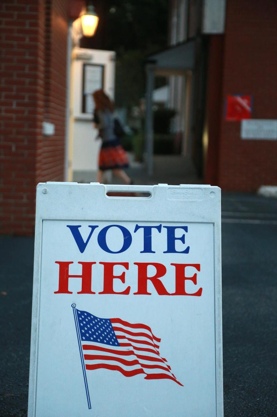 A voter walks into the social hall at First Baptist Church in Garden City during the general election.