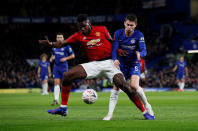 Soccer Football - FA Cup Fifth Round - Chelsea v Manchester United - Stamford Bridge, London, Britain - February 18, 2019 Manchester United's Paul Pogba in action with Chelsea's Jorginho REUTERS/David Klein