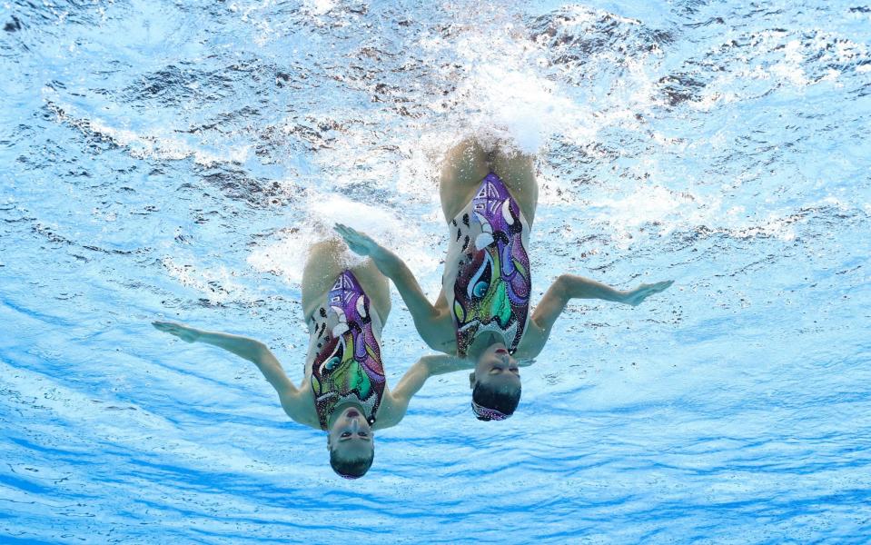 Team Italy perform in the artistic swimming event - GETTY IMAGES