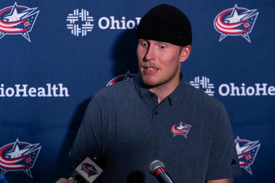 Blue Jackets forward Patrik Laine speaks during media day prior to the start of training camp at Nationwide Arena.