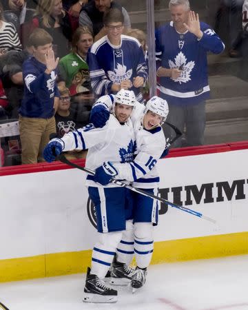 Oct 7, 2018; Chicago, IL, USA; Toronto Maple Leafs center John Tavares (91) celebrates his hat trick goal with center Mitchell Marner (16) during the third period against the Chicago Blackhawks at United Center. Mandatory Credit: Patrick Gorski-USA TODAY Sports