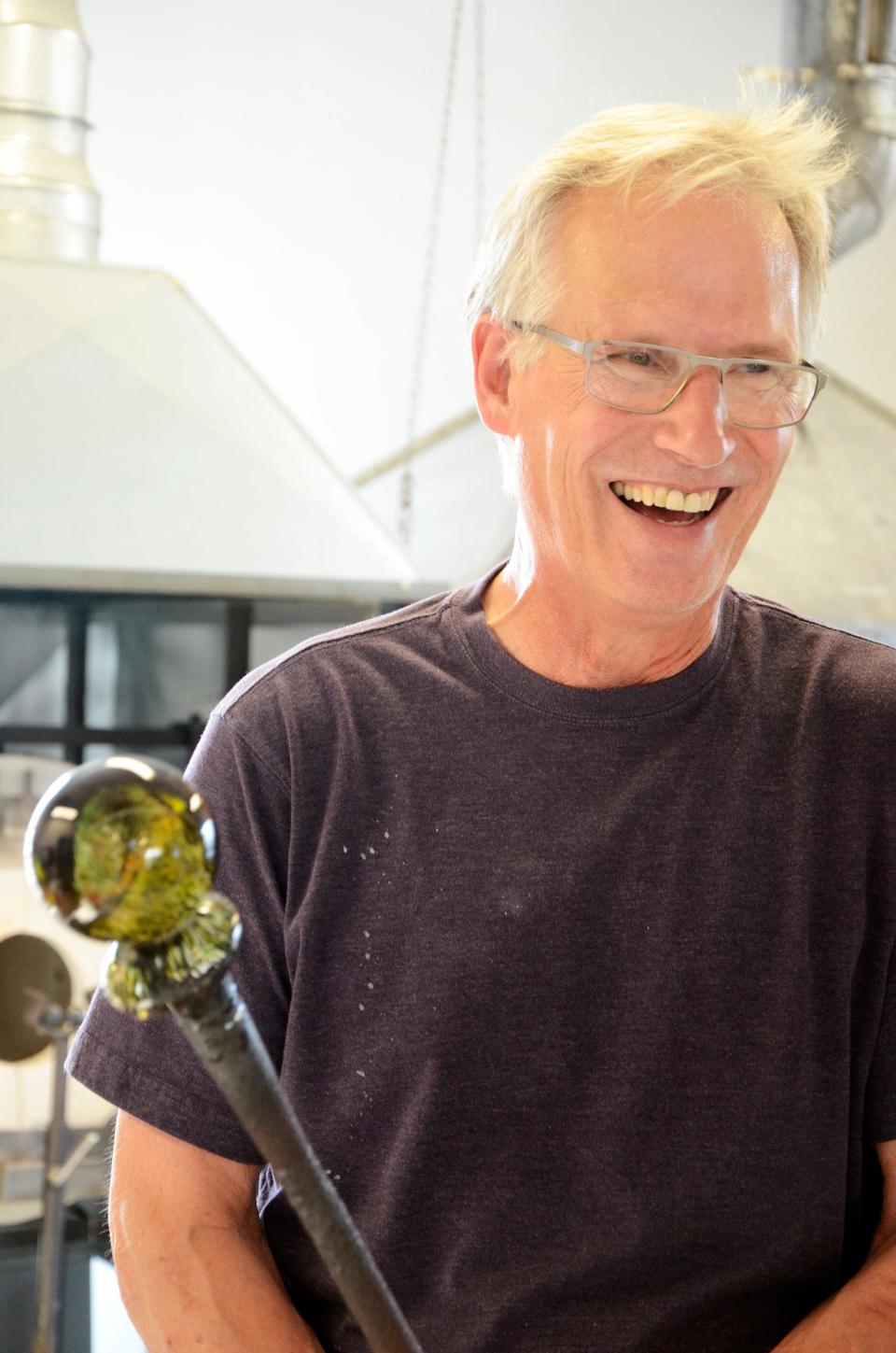 Harry Boyer of Boyer Glassworks Studio and Gallery works on a piece during a hand-blown glass demonstration in 2018 during Night of the Arts in Harbor Springs.