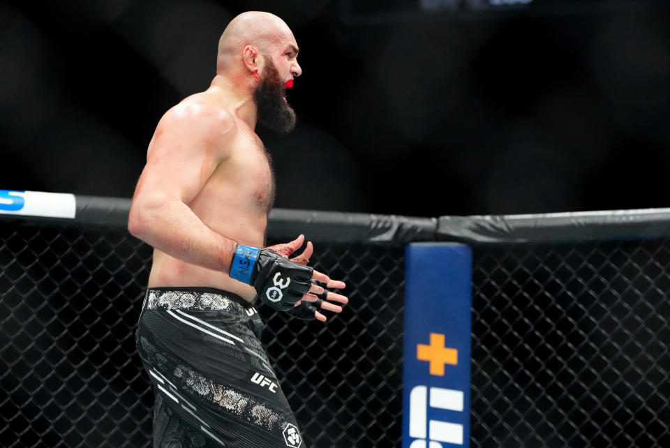 Dec 16, 2023; Las Vegas, Nevada, USA; Shamil Gaziev (blue gloves) reacts after defeating Martin Buday (not pictured) during UFC 296 at T-Mobile Arena. Mandatory Credit: Stephen R. Sylvanie-USA TODAY Sports