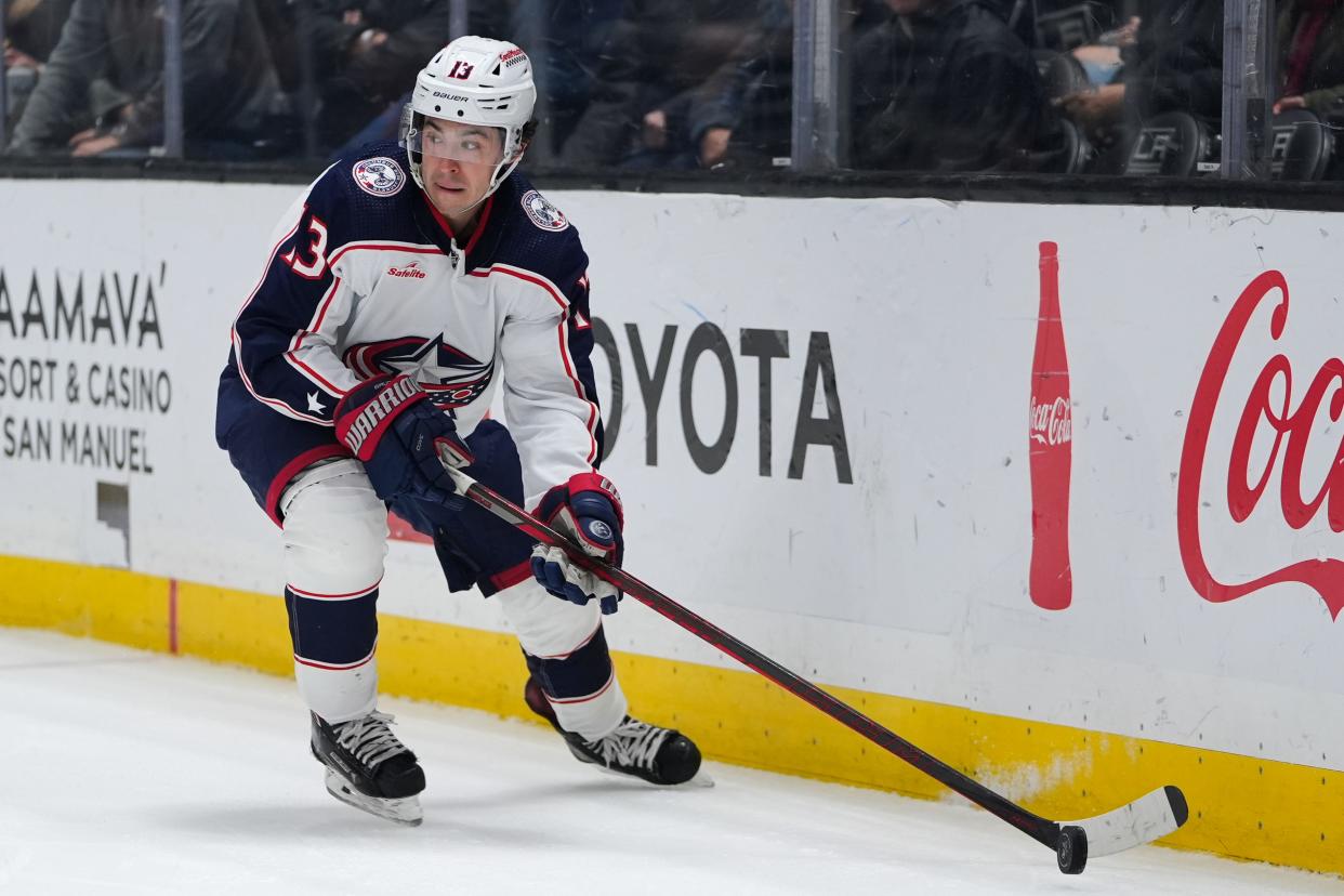 Columbus Blue Jackets left wing Johnny Gaudreau controls the puck during the first period of the team's NHL hockey game against the Los Angeles Kings, Tuesday, Feb. 20, 2024, in Los Angeles. (AP Photo/Ryan Sun)