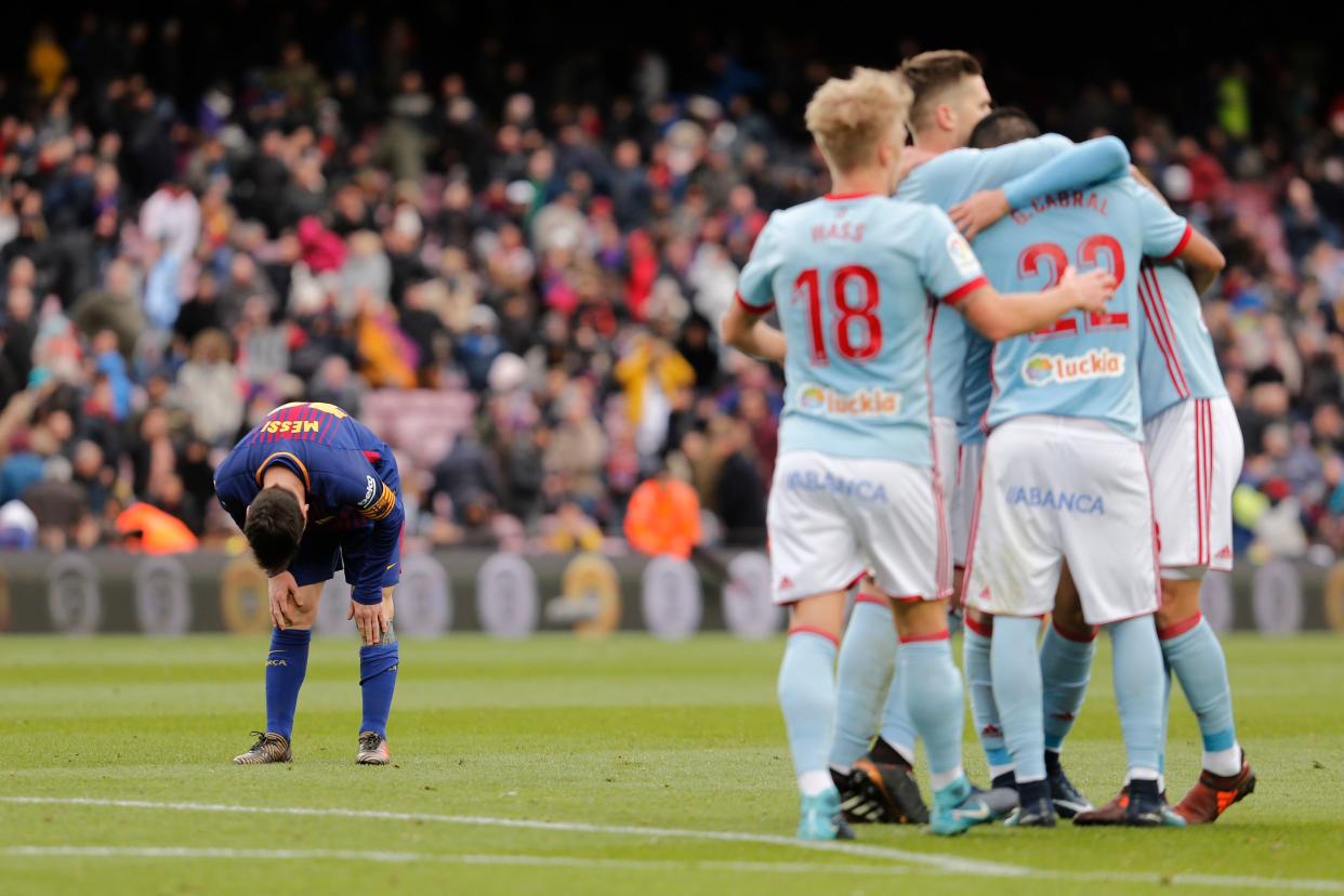 Celta Vigo celebrates one of its two goals Saturday against Barcelona at Camp Nou. (Getty)