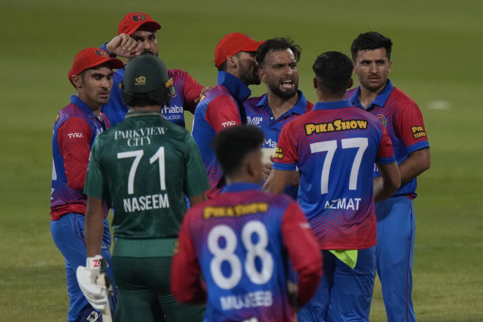 Afghanistan's Fareed Ahmad, third right, reacts after dismissing Pakistan's Asif Ali during the T20 cricket match of Asia Cup between Pakistan and Afghanistan, in Sharjah, United Arab Emirates, Wednesday, Sept. 7, 2022. (AP Photo/Anjum Naveed)